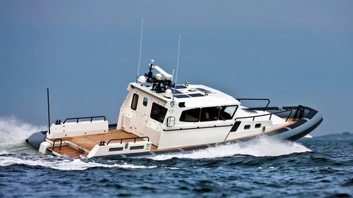 Barco profissional barco utilitário - 50  - RUPERT MARINE - barco de apoio offshore / com motor de centro hidrojato / a diesel