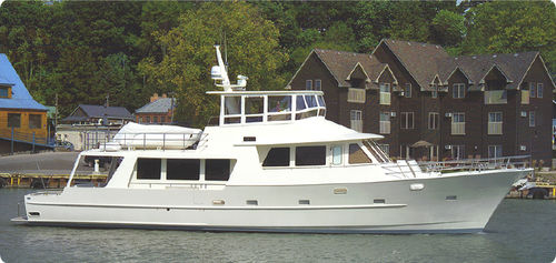 Iate a motor de cruzeiro - PASSAGE MAKER 74 - Kanter Yachts - trawler / com casa do leme / com casco de deslocamento