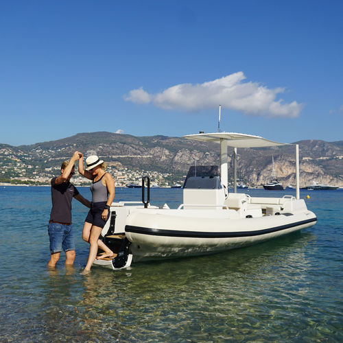 Barco inflável com motor de centro - BEACHLANDER Series - Xtenders - semirrígido / com console central / de mergulho