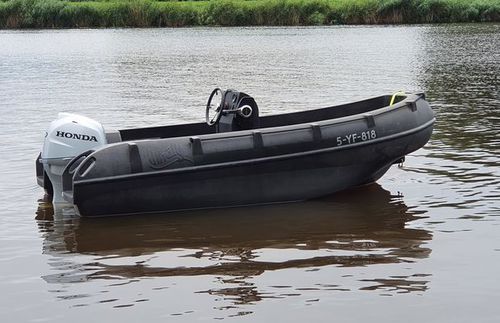 Bote com motor de popa - 400 - WHALY BOATS  - open / com console central / de lazer