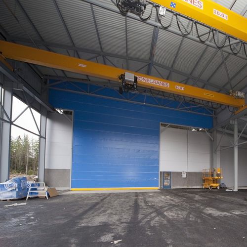Porta para estaleiro naval - Crane  - Champion Door Oy  - de correr na vertical / elétrica