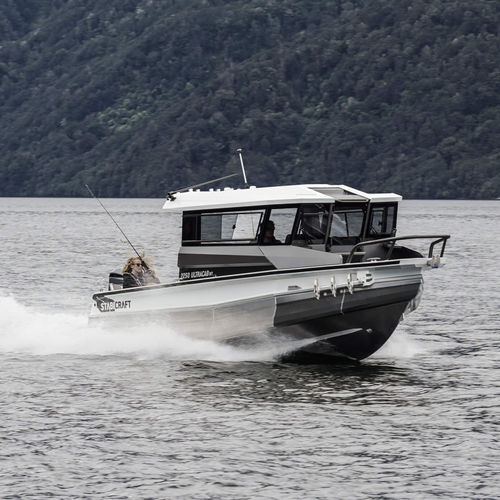 Barco de pesca-passeio com motor de popa - 2250 ULTRACAB WT - Stabicraft - com casa do leme / máx. 8 pessoas