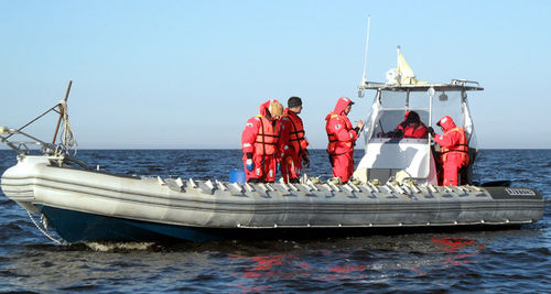 Barco inflável com motor de popa - RIB 1100-G  - Vector Inflatables - bimotor / de casco rígido (RIB) / com console central