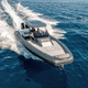 barco inflável com motor de popa / bimotor / semirrígido / com console central